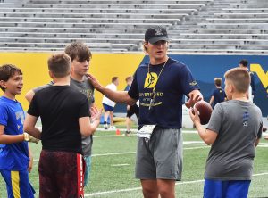 WVU's young QBs are looking to repay Brown's trust this season
